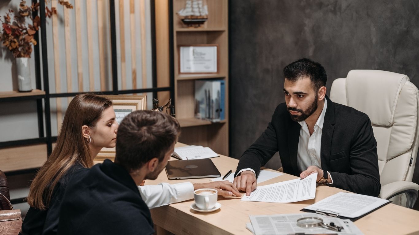 Business lawyer NYC advising client in professional law firm office in New York