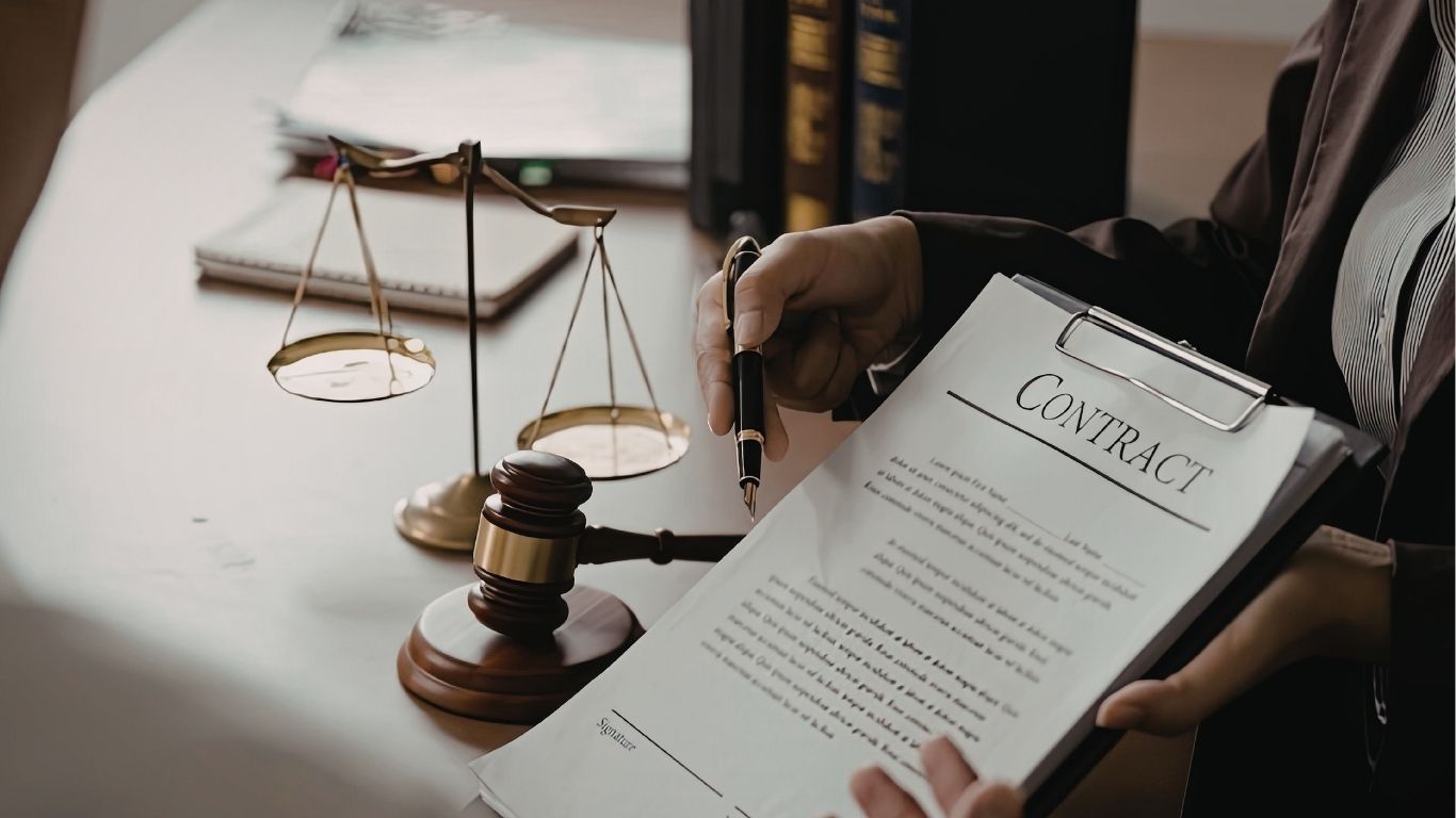 New York attorney reviewing contract dispute documents with client in NYC office