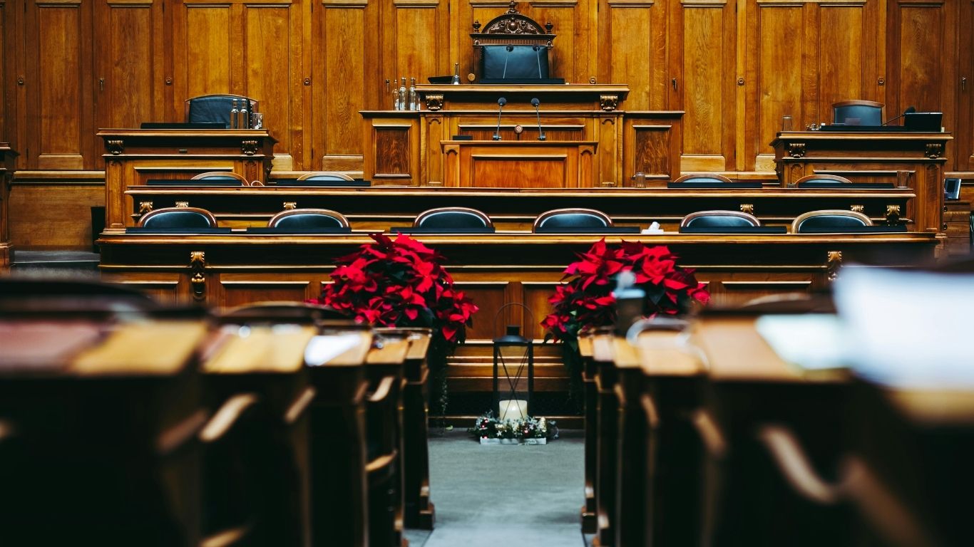 New York attorney advising clients on legal strategy in a professional NYC law firm office