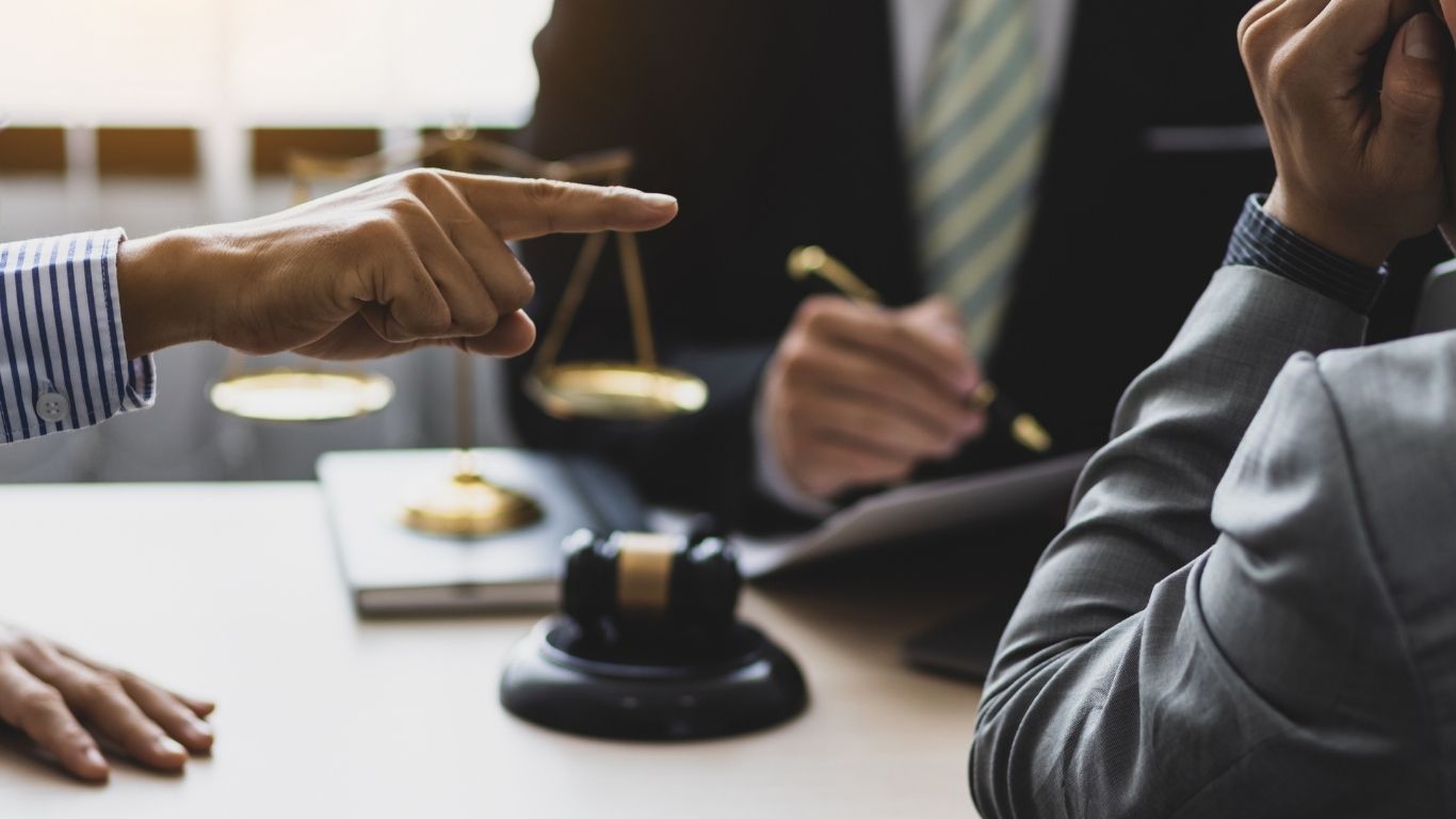 New York attorney providing early legal advice during a professional client consultation to help prevent costly legal disputes.