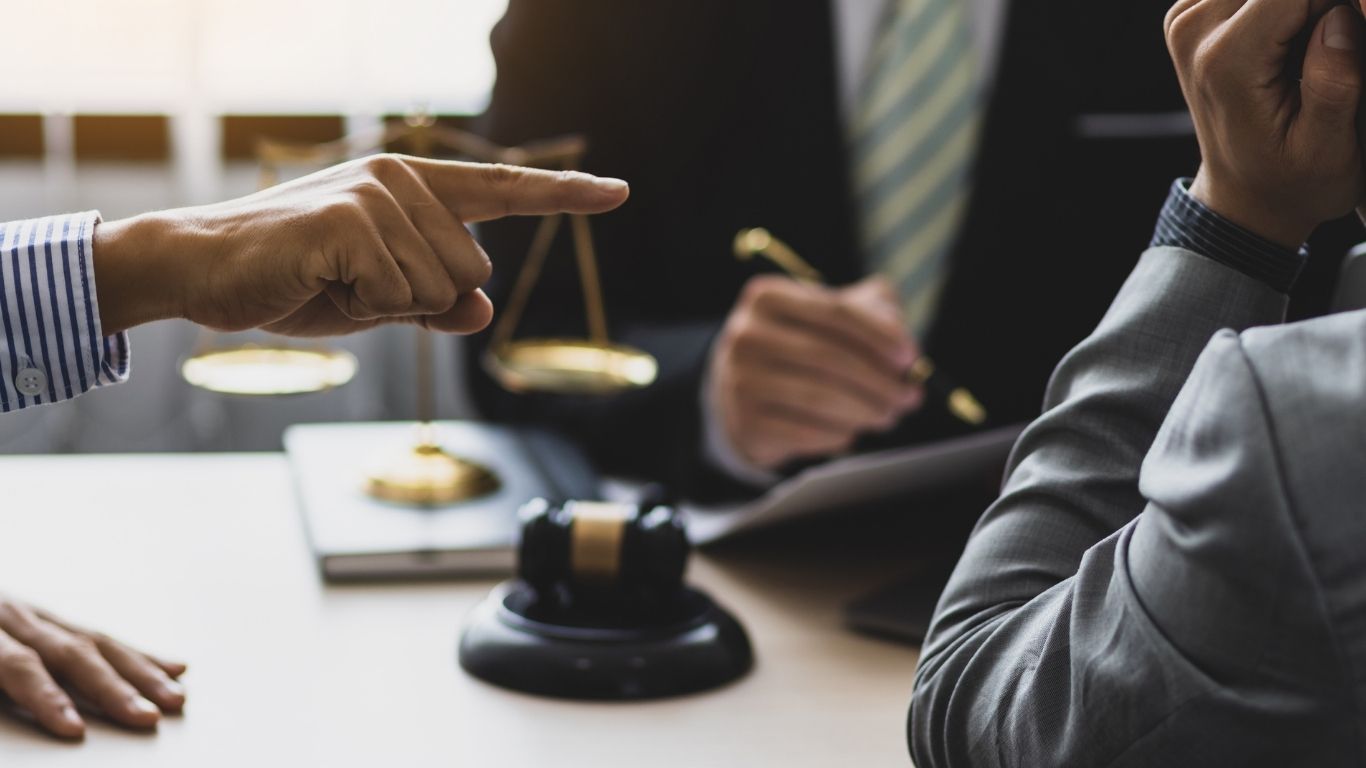 Resolve a business dispute without court through mediation or negotiation