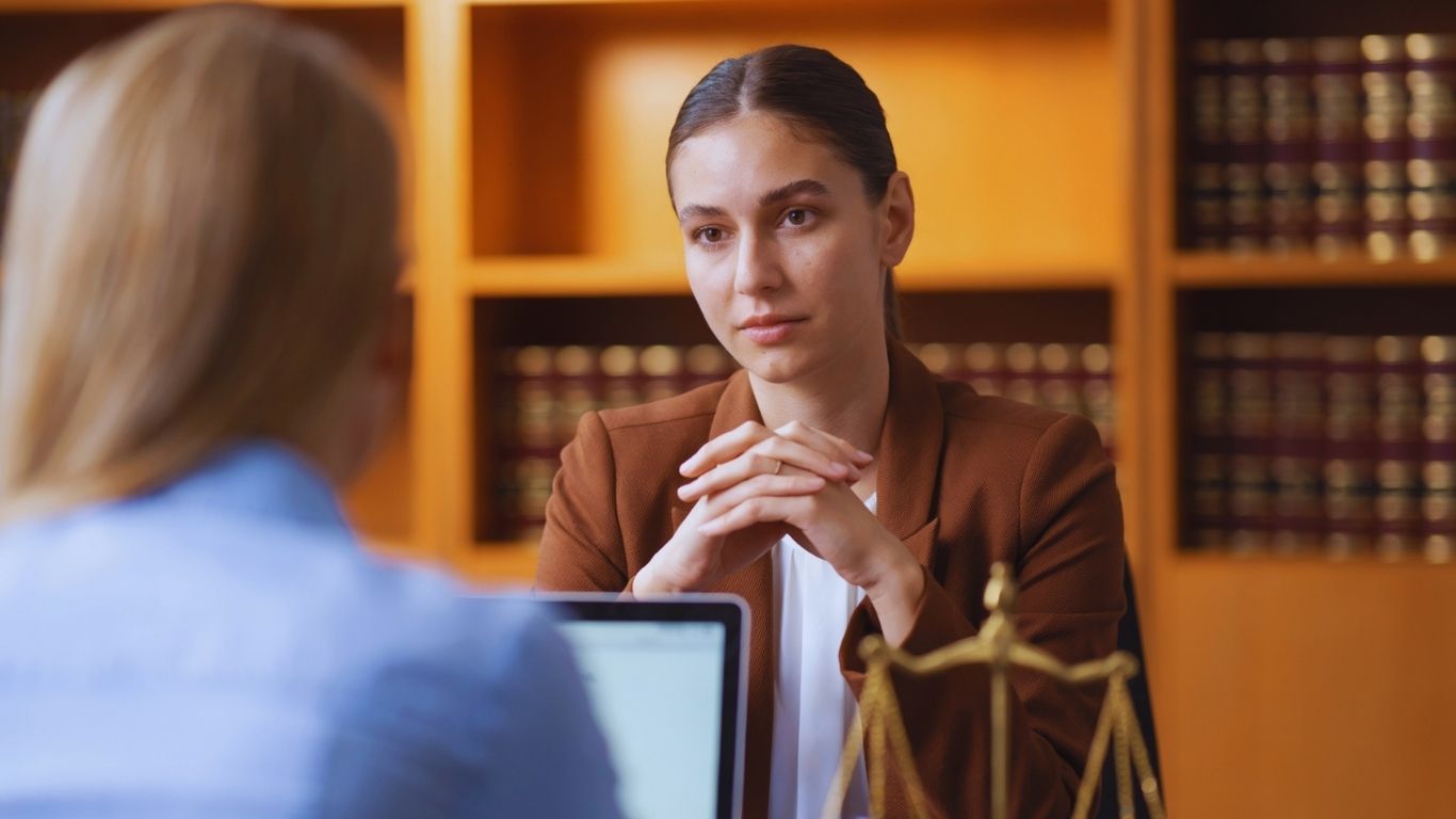 Contract lawyer and litigation attorney reviewing documents for a New York business dispute